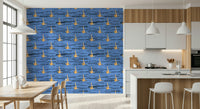 Textured blue water, repeated golden legs, Water Rhythms wall covering.