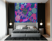 Trendy Groovy Geometry wall paper roll with electric blue and hot pink tones.