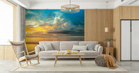 Tropical beach view with colorful clouds for a wall mural.