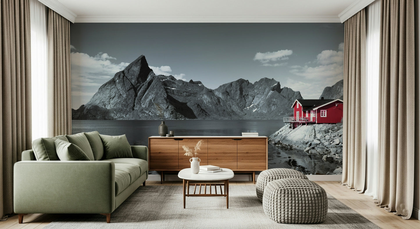 Jagged mountain peaks behind red house on Fjord Home Wall Mural.