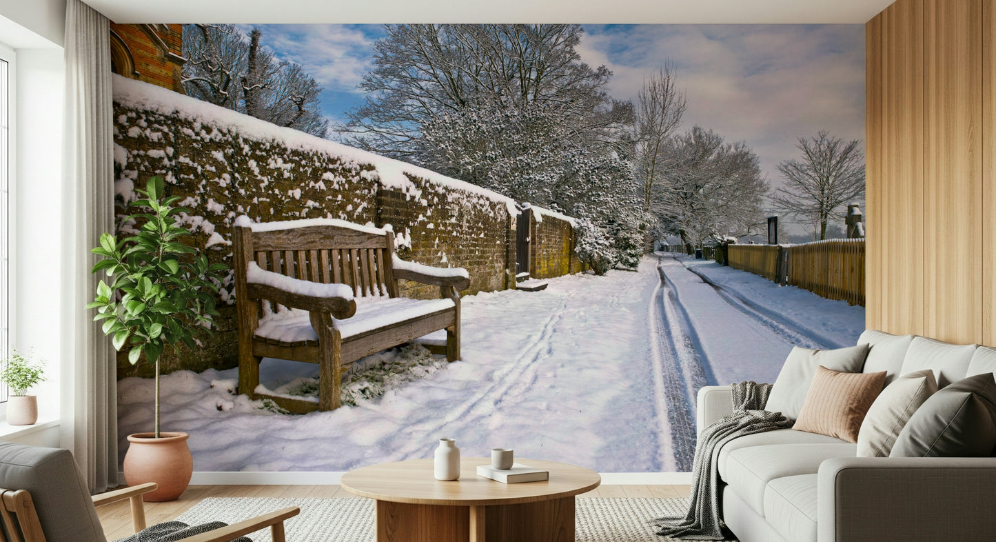 Peaceful winter scene Snowy Bench Retreat wallpaper for walls.