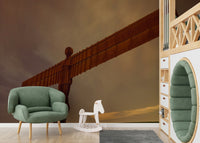 Dramatic red-brown metal Angel of the North Wall Mural, moody night time scene.