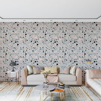 Small irregular mosaic pieces create this unique vibrant multicolour terrazzo wallpaper for walls.