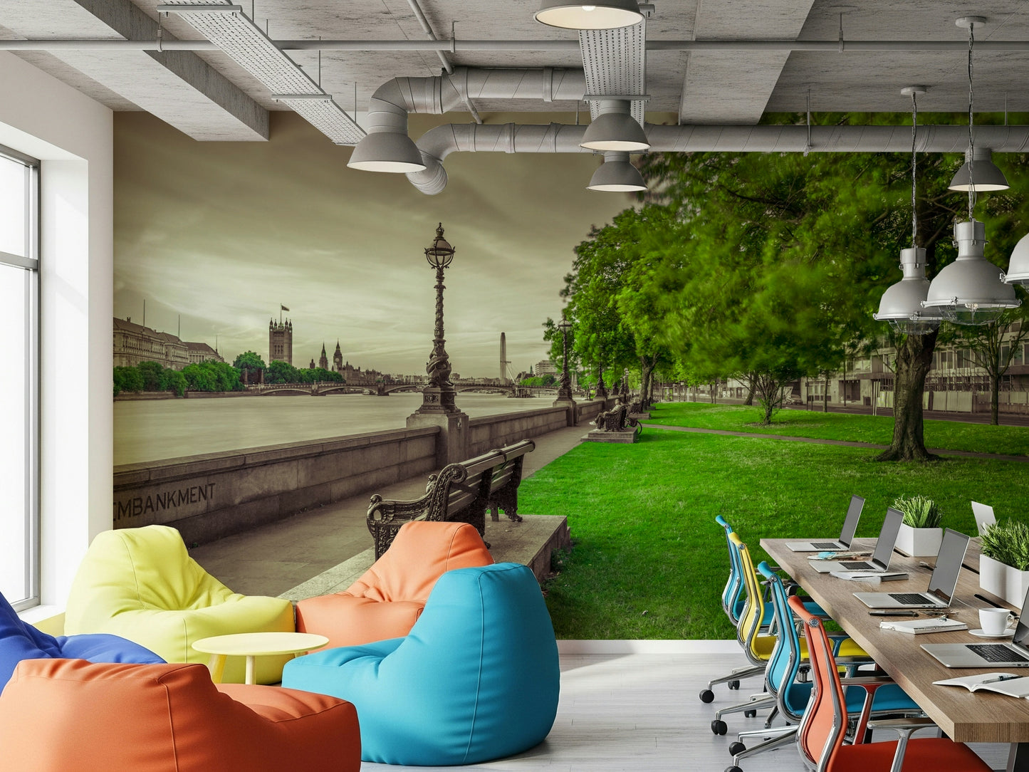 Grassy riverbank mural showing Victorian lamp post and London architecture.