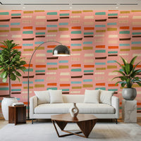 Designers' choice blocks pink wallpaper, striking art deco feel.
