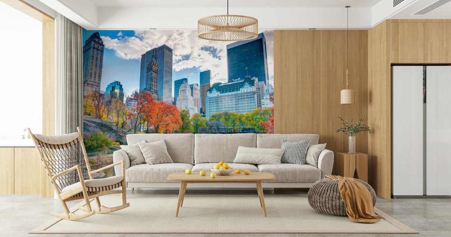 Colorful Fall foliage, reflective pond, City skyline wallpaper design.