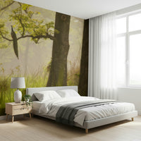 Forest wallpaper mural deep green haze tall trees design.