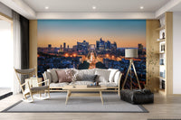 Metropolis Dusk Wall Mural in deep blue and orange tones for lounge.