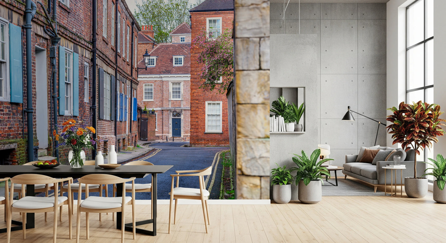 Traditional English townscape wall mural in a light-filled corridor.