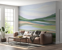 Cool blue and green watercolor landscape artwork.