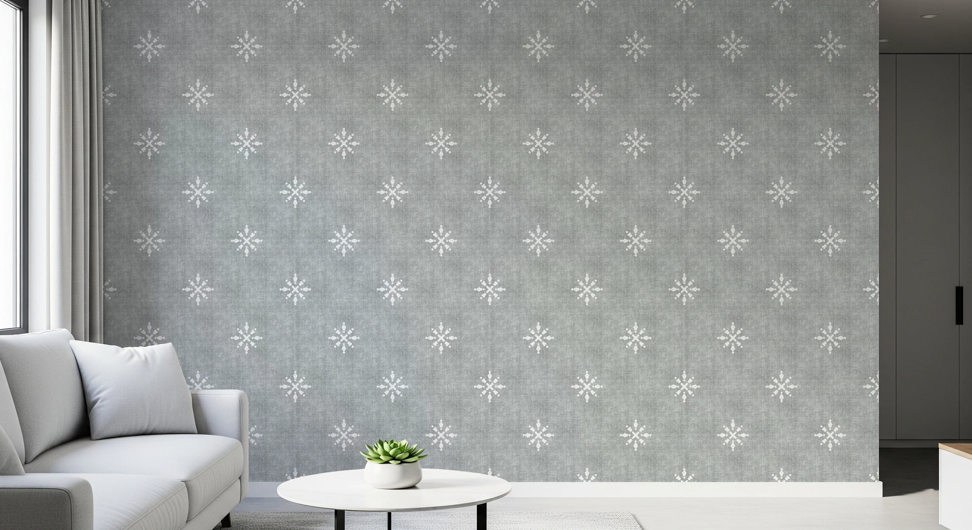 Grey grunge wall covering with symmetric motifs