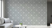 Grey grunge wall covering with symmetric motifs