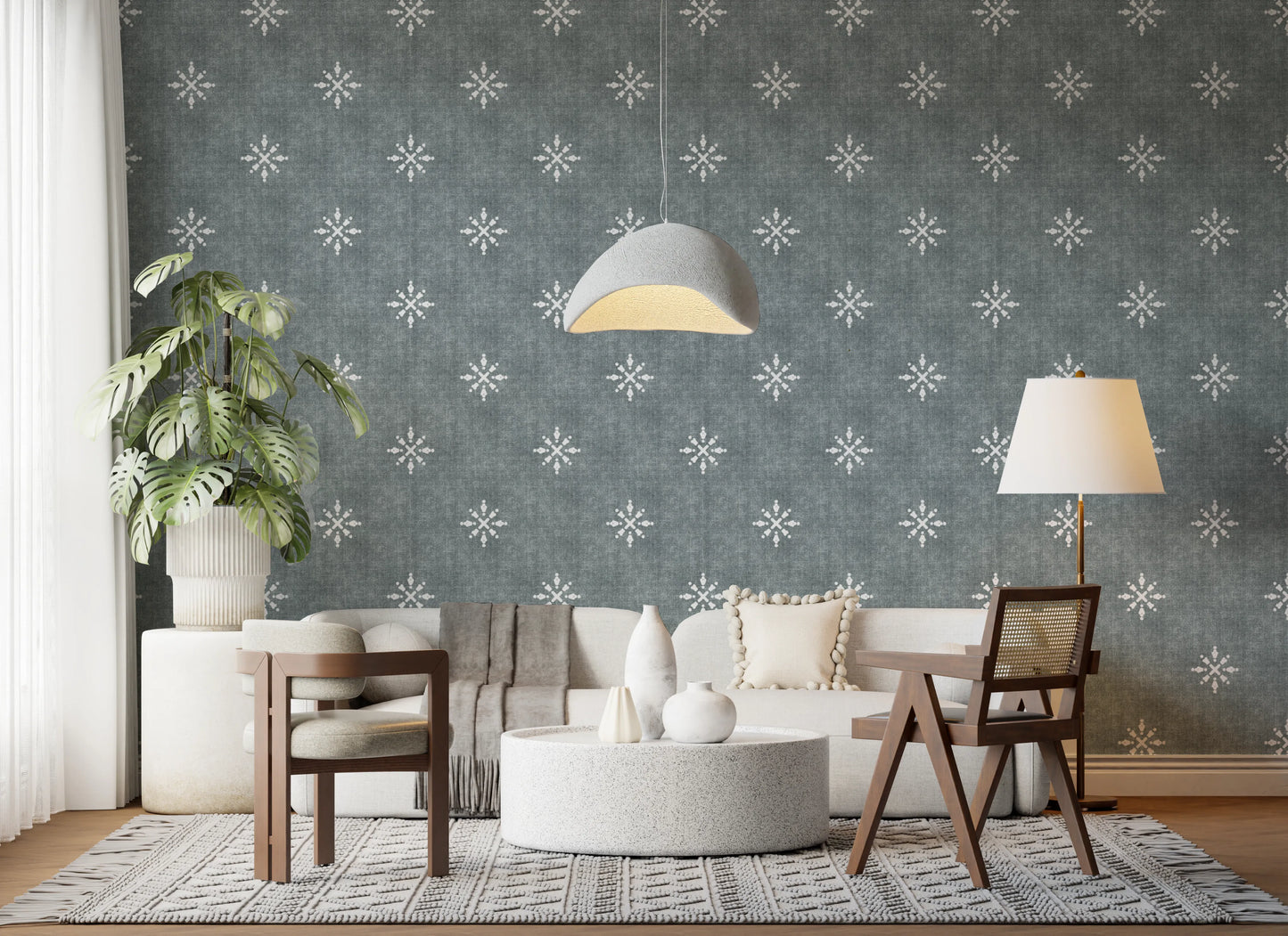 White starburst motifs on denim blue background