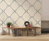 Hand-stamped bead character carries Beachy Boho Coastal Slate Blue Dotted Lattice wallpaper.
