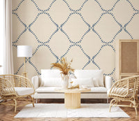 Living room on quiet contrast from Beachy Boho Coastal Slate Blue Dotted Lattice wallpaper.