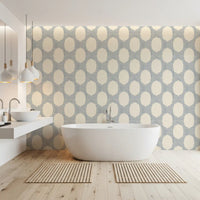 Cream ovals cut openly through dense dot fields on Beachy Boho Slate Blue Mosaic wallpaper.