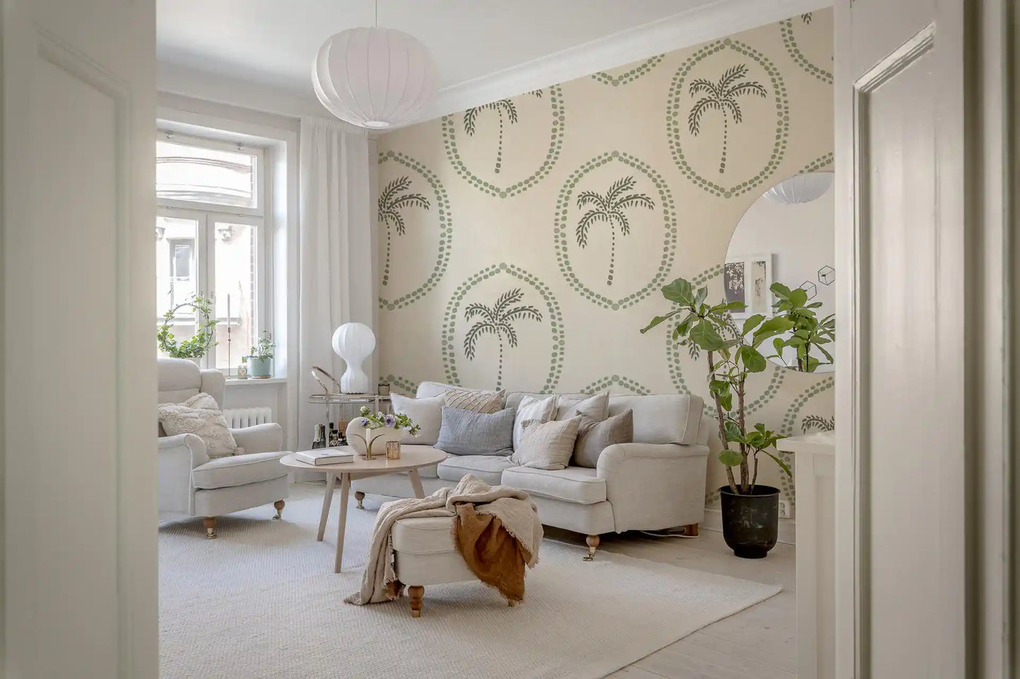 Living room calmer behind soft sage motifs from Beachy Boho Palm Coastal Green Medallion wallpaper., GD9631