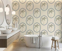Bathroom feature takes on coastal calm from Beachy Boho Palm Oasis Slate Blue Medallion wallpaper.