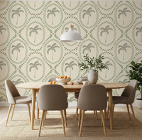 Sage bead medallions stretch across the dining area on this Beachy Boho Palm Coastal Green wallpaper.