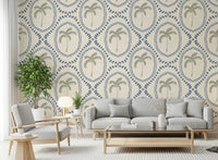 Living room turns coastal through Beachy Boho Palm Oasis Slate Blue wallpaper detail.