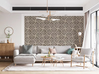 Cream backdrop steadies dark brown textured scallops fan motifs on Japandi wallpaper.