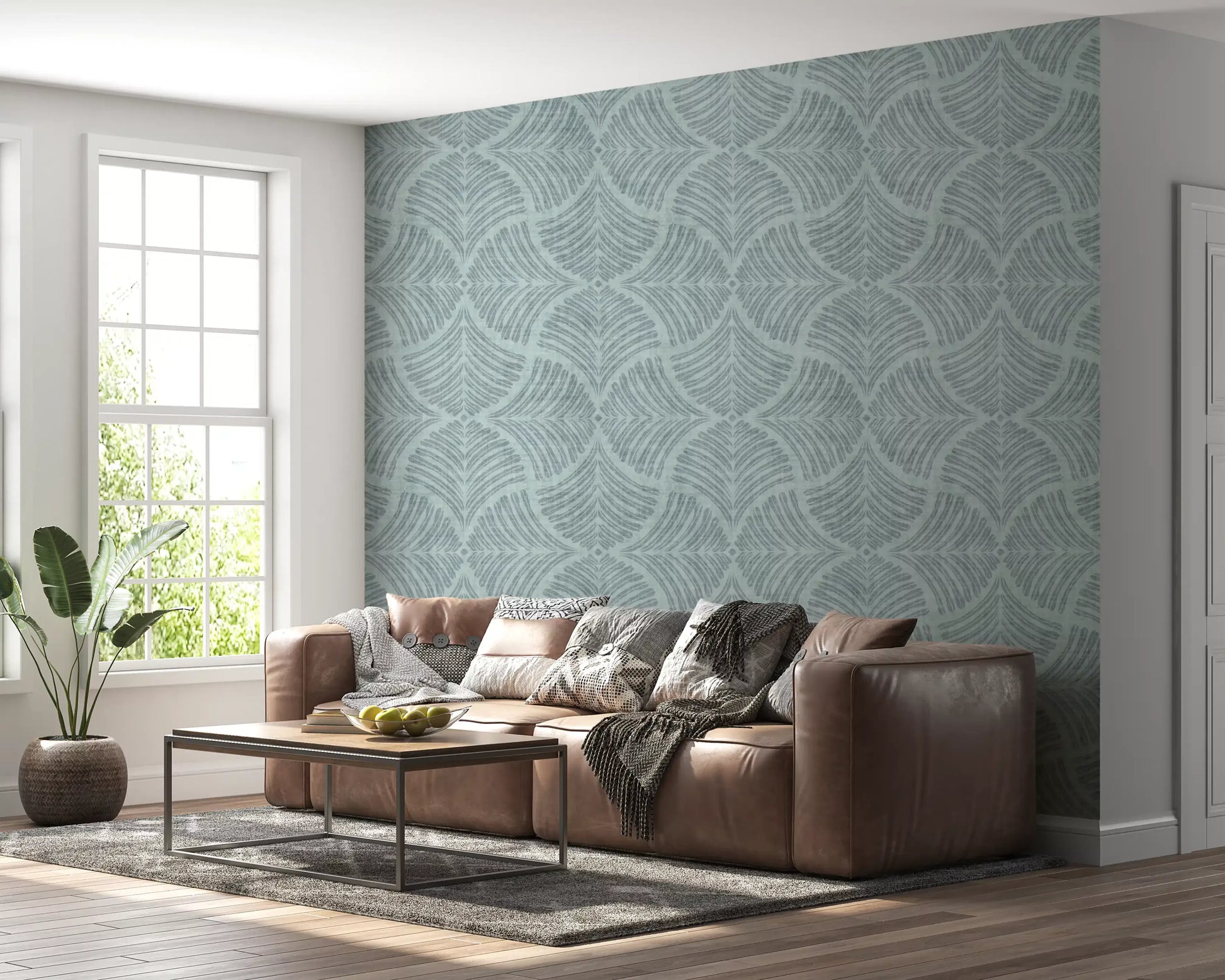 A lounge soaks in calm tones from this dusty blue scallop fan wallpaper.