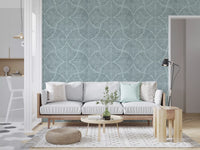 Pale scallop motifs mirror across this calm dusty blue Japandi wallpaper.