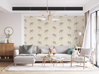 Sage palm patterns charm a Living room space with this tropical wallpaper.