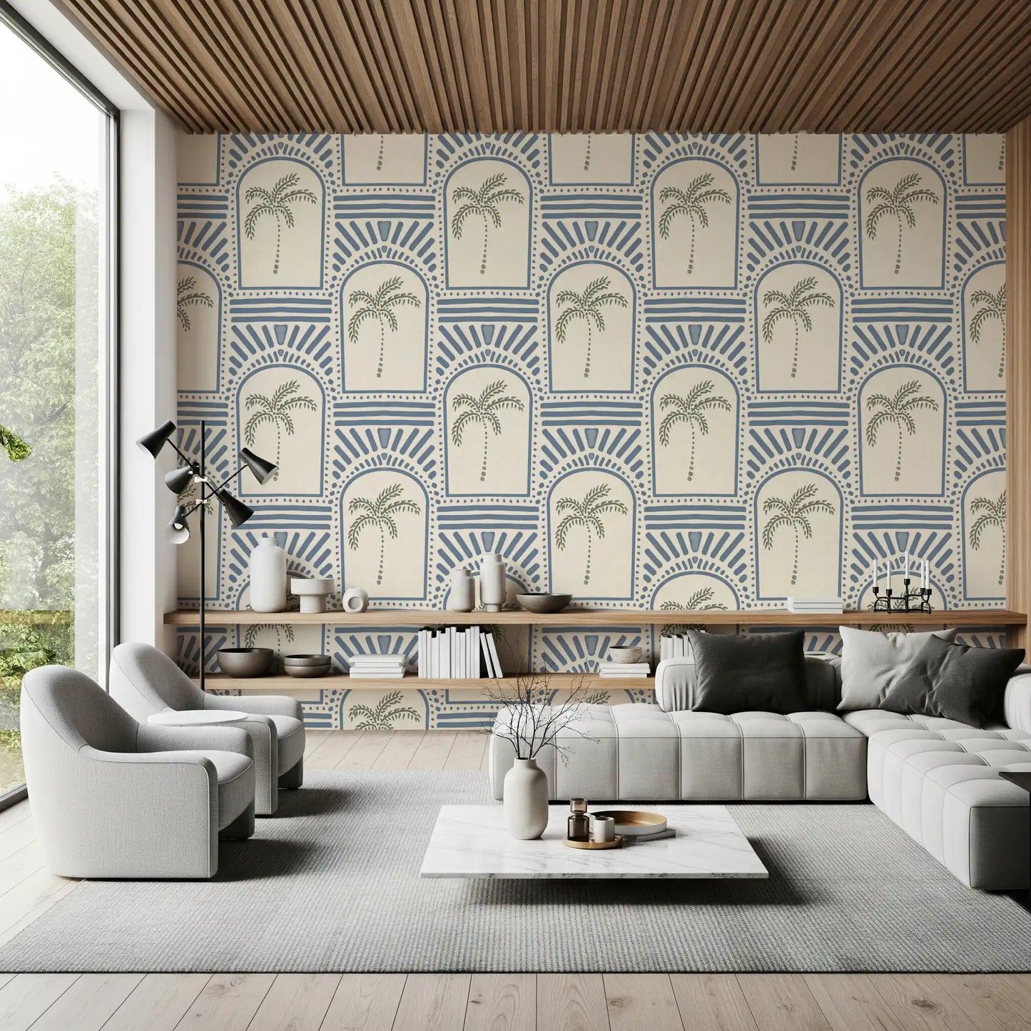Roomy lounge view with slate blue archway wallpaper, sage palm trees inside arches.