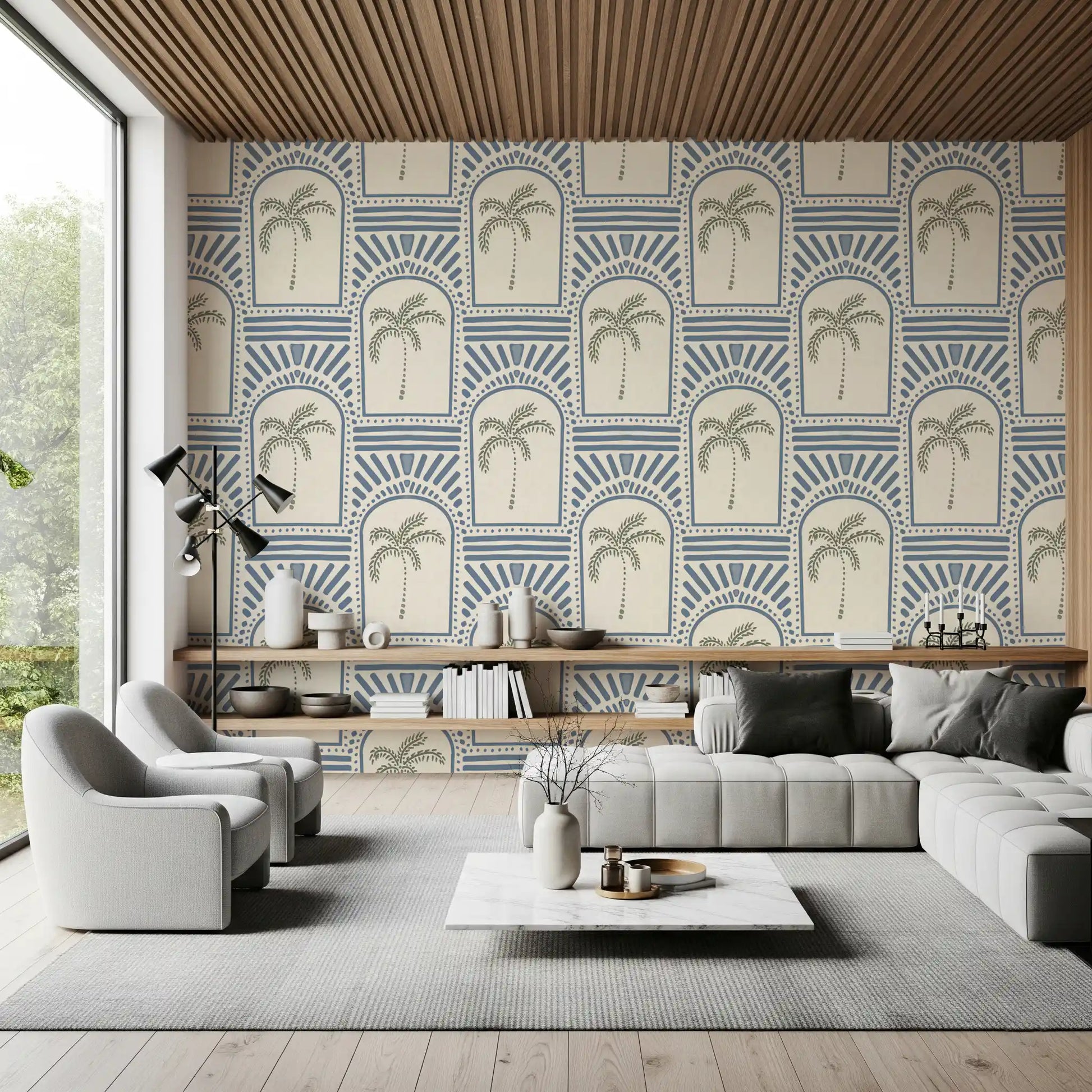 Roomy lounge view with slate blue archway wallpaper, sage palm trees inside arches.