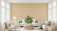 Sand-and-cream lounge view next to trellis wallpaper with hex Deco frames in honey tones., GD9661