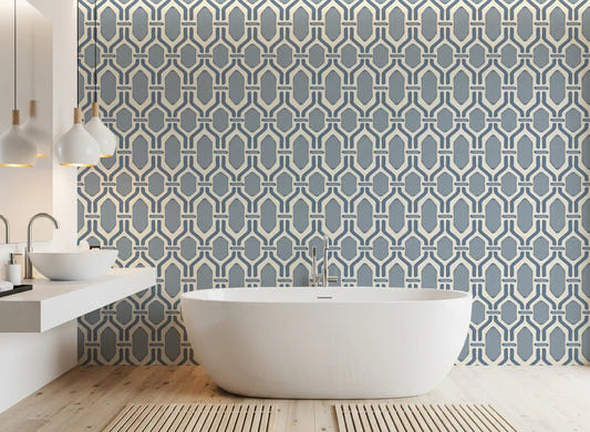 Hex-frame trellis wallpaper laying calm slate blue rhythm along a bright bathroom .