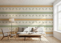 Gold-and-sage Marrakesh Orizzontal stripe wallpaper hugging a relaxed lounge corner.