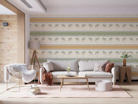 Mustard-and-cream Marrakesh stripe wallpaper flowing along a calm Living room feature .