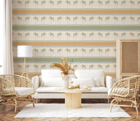 Honey-and-sage living room with Marrakesh Orizzontal striped wallpaper, palm rows.