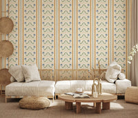 Multicolor Marrakesh ornament wallpaper drawing the eye in a calm living room view.
