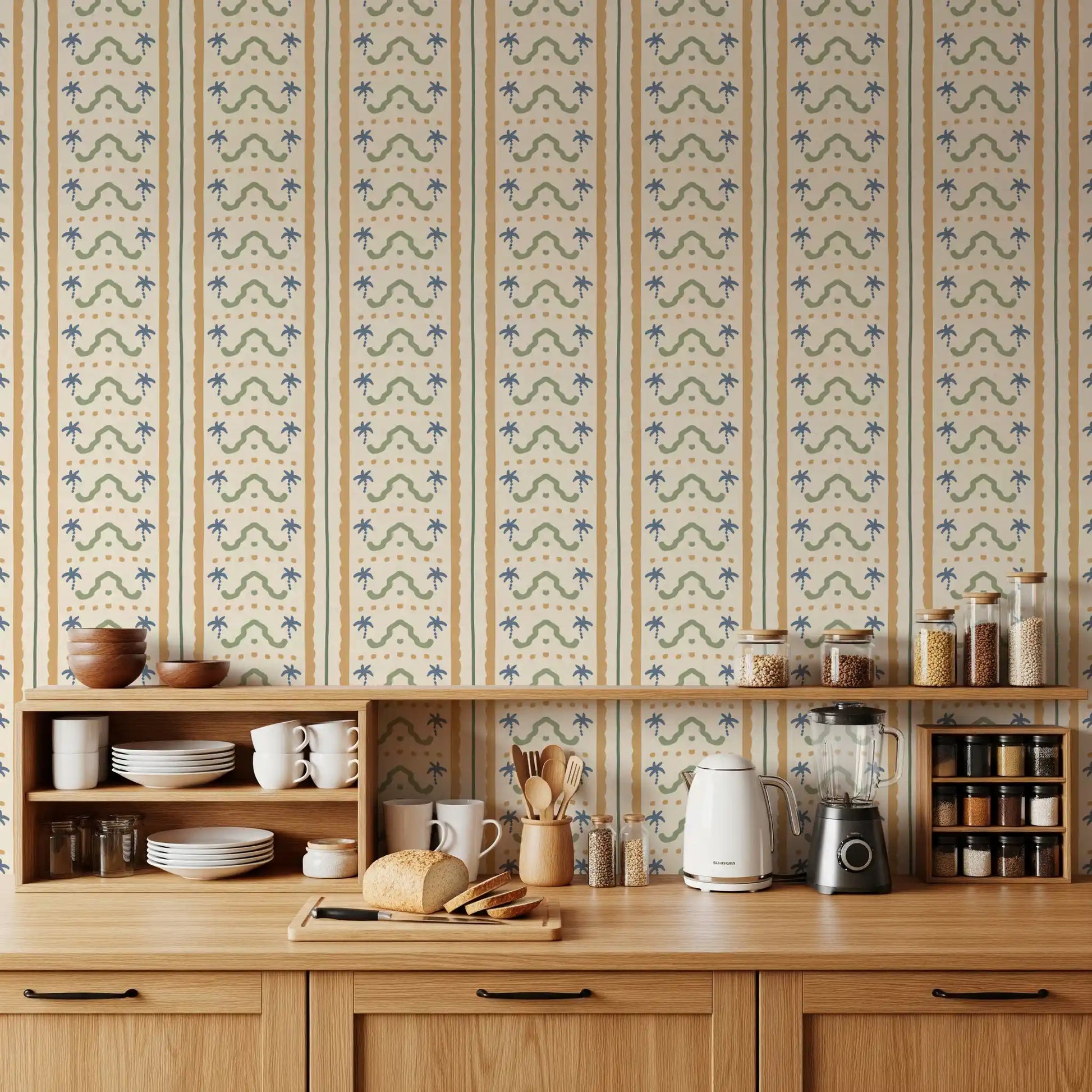 Marrakesh striped wallpaper behind a warm kitchen-dining setup, palm motifs visible.