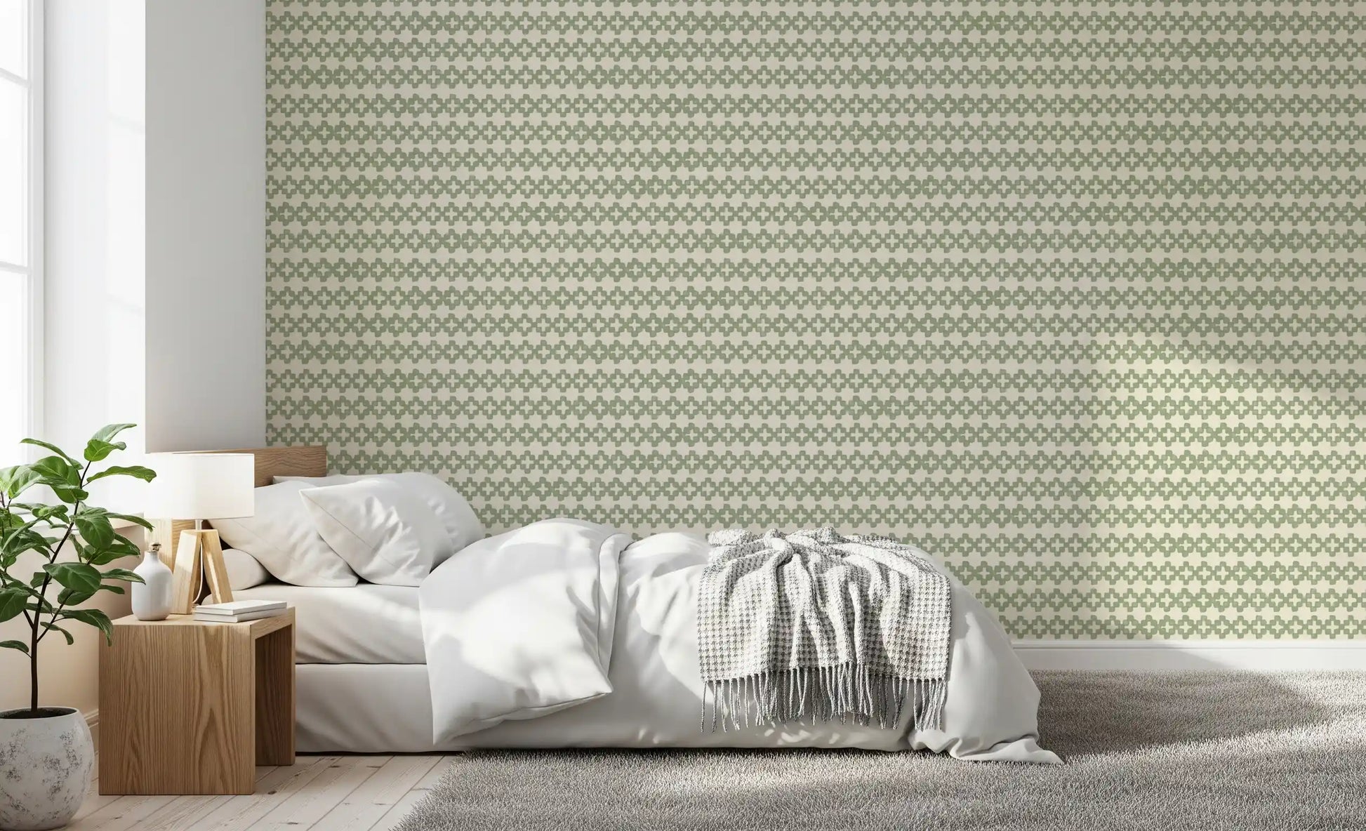 Sage-green ornament rows alternate in this zellige cross wallpaper, cream linen visible., GD9667