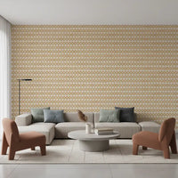 Warm-tone cross stamps alternating row by row on a cream linen zellige wallpaper.
