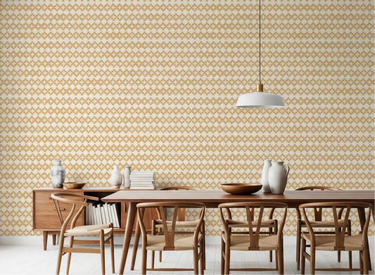Warm dining room view backed by sand zellige cross wallpaper across rows.