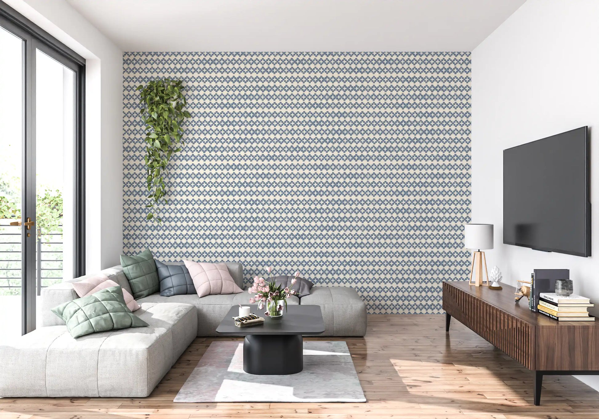 Calm rows of cross tiles in slate blue zellige wallpaper backing a relaxed living room., GD9669