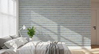 Slate blue cross motifs lined up in horizontal rows on a cream linen zellige wallpaper., GD9669