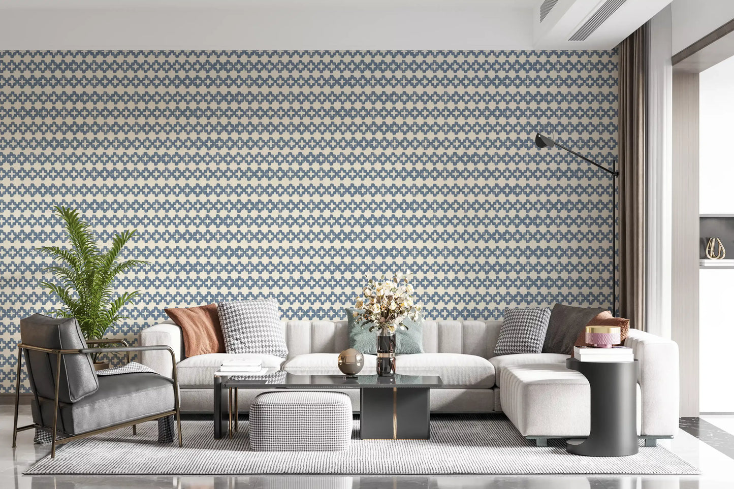 Relaxed lounge corner with slate blue zellige cross wallpaper drawn over the ., GD9669