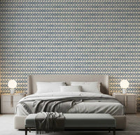A bedroom feature framed by slate blue zellige cross wallpaper across tile-pattern rows., GD9669