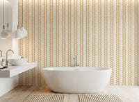 Sand zellige stripe wallpaper warming up a calm bathroom backdrop.