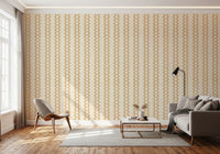 Cream-grounded zellige stripe wallpaper lining a relaxed lounge area.