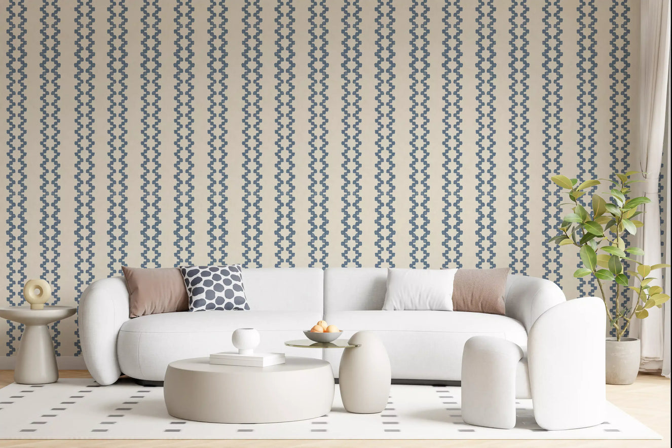 Slate blue zellige ornament wallpaper grounding a calm living room scheme.