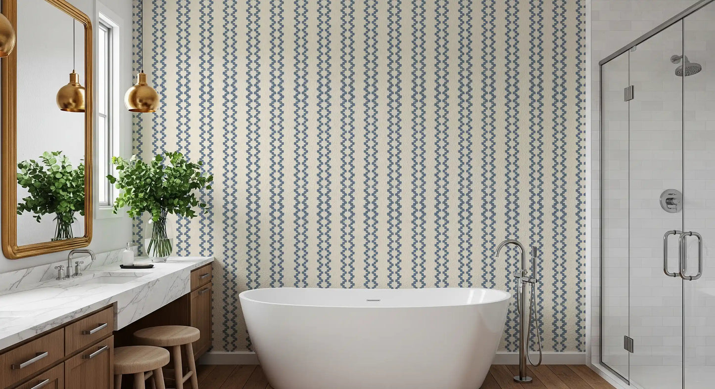 Detail view of slate blue zellige stripe wallpaper with beaded zigzag column rhythm.