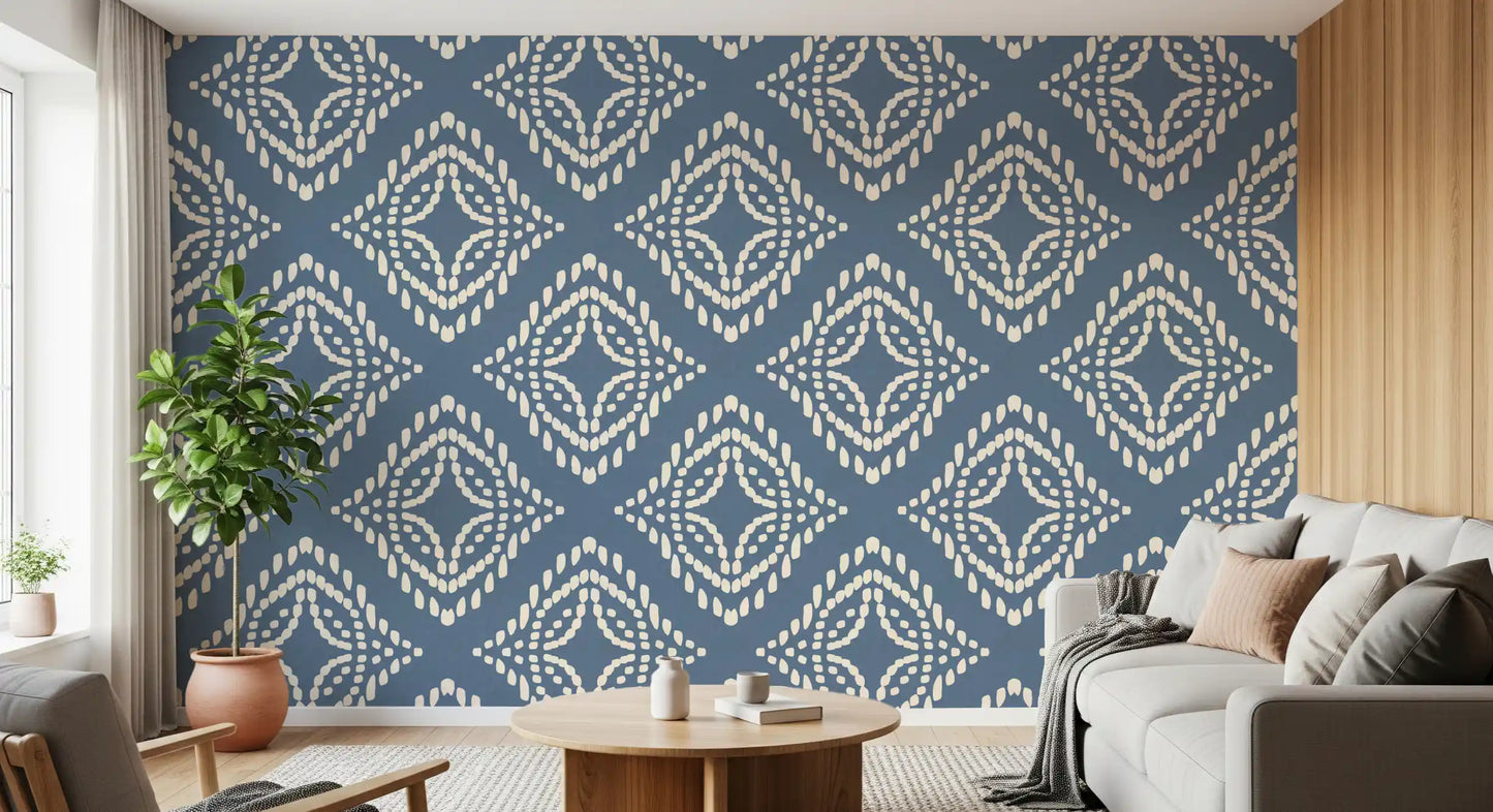 Cream diamond stamps fill a relaxed living room across this slate blue canvas wallpaper.