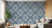 Cream diamond stamps fill a relaxed living room across this slate blue canvas wallpaper.